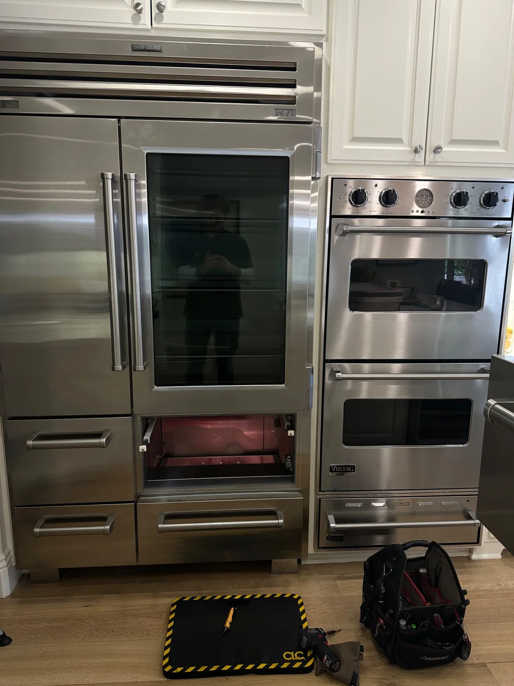 Sub-Zero refrigerator and Viking wall ovens in a Bellevue kitchen