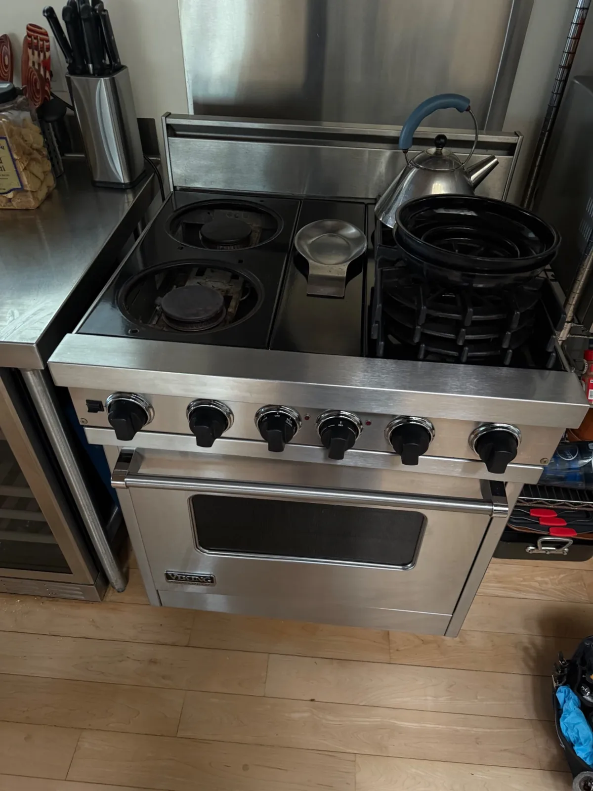 Viking range top opened for burner diagnosis