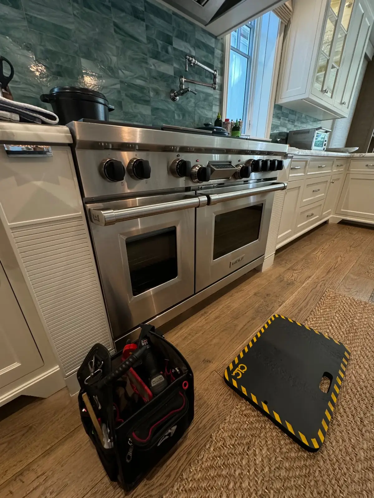Wide Wolf range suited to a large residential kitchen
