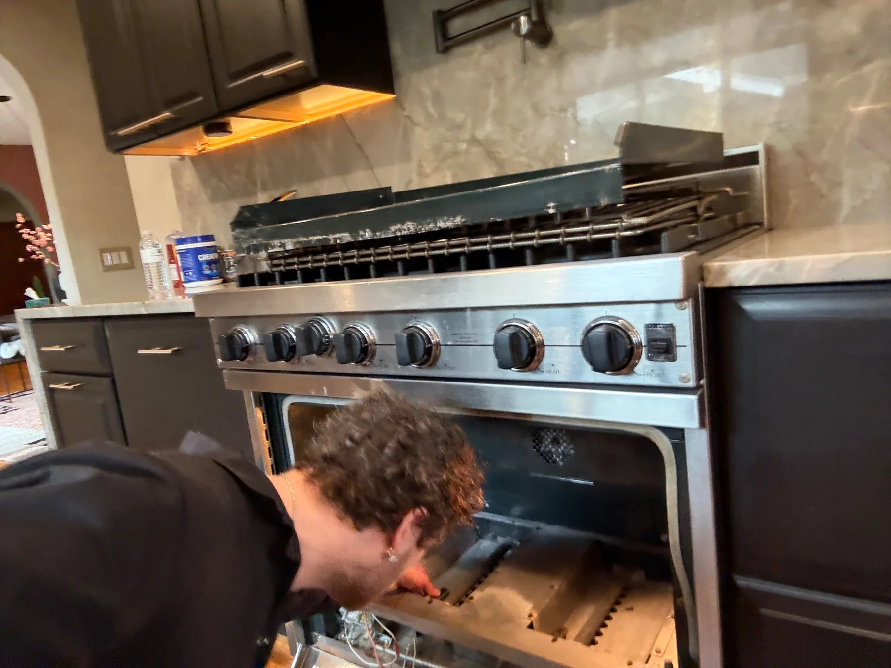 Technician servicing Viking range